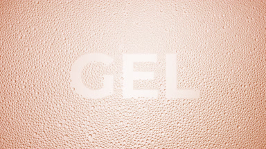 Gel writing blown off the wet glass on beige background
