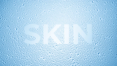 Skin word blown off the wet glass on blue background