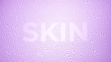 Skin word blown off the wet glass on violet background