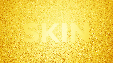 Skin word blown off the wet glass on yellow background