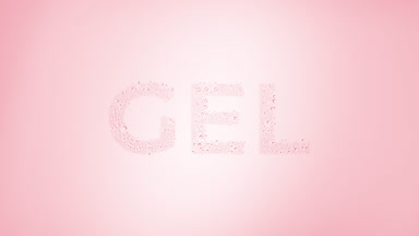Gel text blown off the wet glass on pink background