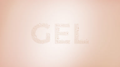 Gel text blown off the wet glass on beige background