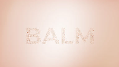 Balm writing blown off the wet glass on beige background