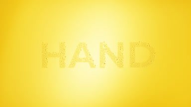 Hand word blown off the wet glass on yellow background