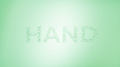 Hand word blown off the wet glass on green background