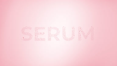 Serum inscription blown off the wet glass on pink background