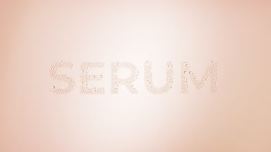 Serum inscription blown off the wet glass on beige background