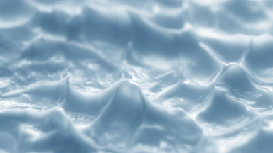 Side view macro turntable shot of blue cream texture in shadow