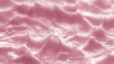 Side view macro turntable shot of pink cream texture in shadow