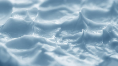 Jib macro turntable shot of blue cream texture in shadow