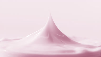 Macro shot of pink cap has been removed from the pink cream