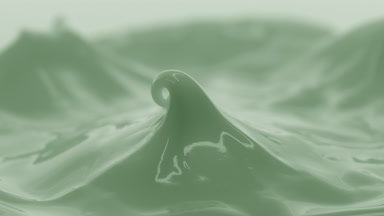 Macro crane shot of green cosmetic cream peak in the shadow