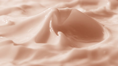 Side view turntable shot of beige cream surface with peak