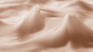Crane shot of glass has been removed from the beige cream