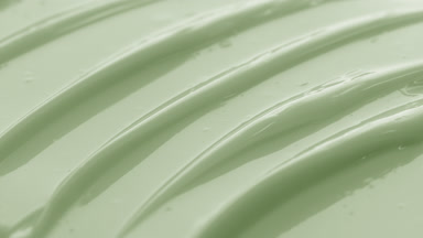 Macro texture of green nourishing cream with aloe vera extract