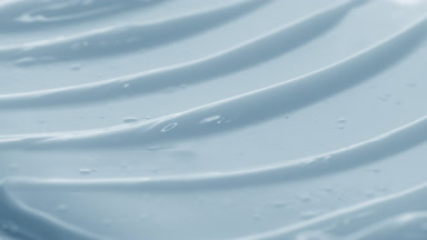 Macro texture of blue eye cream with silica