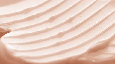 Macro of beige day cream with grapefruit extract and niacinamide