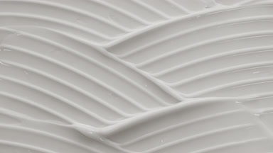 Macro crane shot of white day cream wave texture
