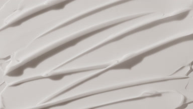 White anti-aging cream furrow texture appears from the shadow