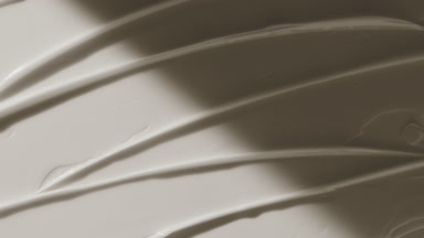 White anti-acne cream furrow texture appears from the shadow