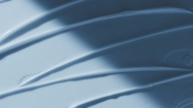 Blue anti-acne cream furrow texture appears from the shadow