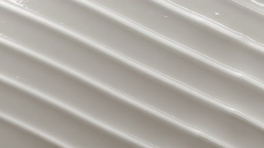 Top view macro turntable shot of white cosmetic cream