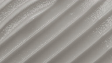 Top view macro turntable white cosmetic cream shot