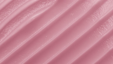 Top view macro turntable pink cosmetic cream shot