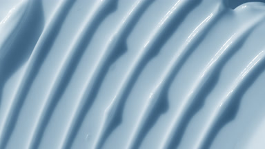 Top view macro turntable blue night cream shot