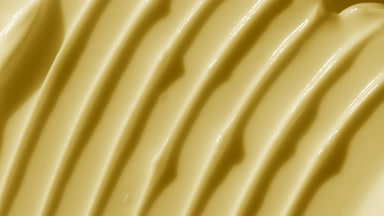 Top view macro turntable yellow night cream shot