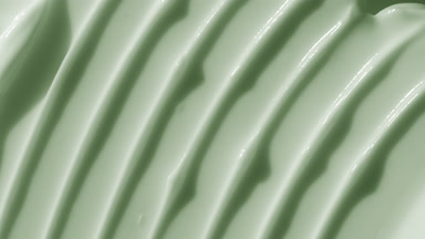 Top view macro turntable green night cream shot