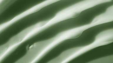 Macro texture of green moisturizing cream with aloe vera extract