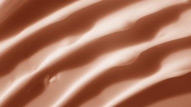 Top view macro texture of organic beige anti-aging cream