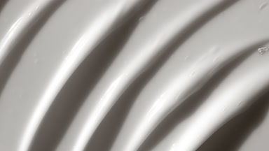 Top view macro texture of white anti-aging cream with creatine