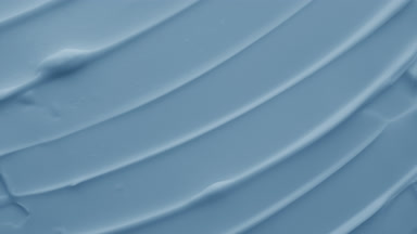 Macro of moisturizing cream with blueberry extract in the shadow