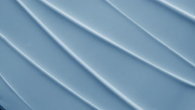 Top view macro shot of blue hydrating cream furrow texture