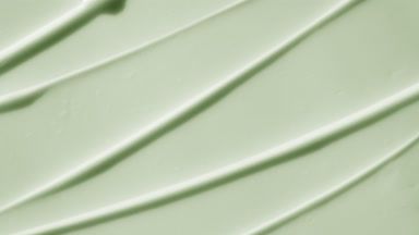 Top view macro turntable shot of green day cream wave texture