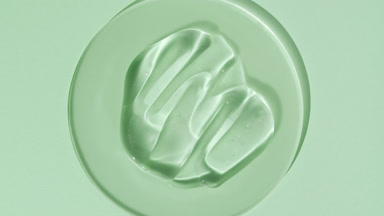 Gel smears on watch glass appear from shadow on green background
