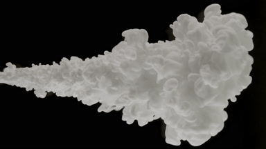 White ink injected in water fills the space on black background