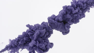 Violet ink is injected in water from corners on white background