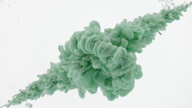 Green ink is injected in water from corners on white background