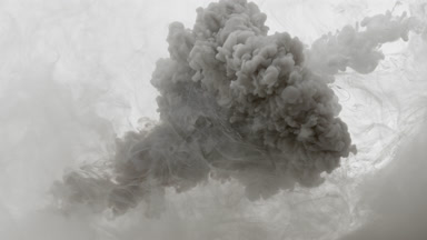 Black and white inks are injected in cloudy water from corners