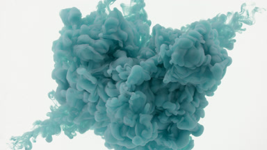 Cyan ink injected in water from two corners on white background