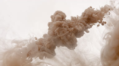 Brown ink is injected in cloudy water mixing on white background