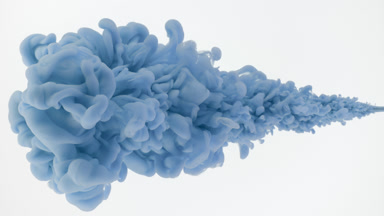 Macro of blue ink being injected in water on white background