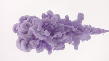 Macro of purple ink is injected in water on white background