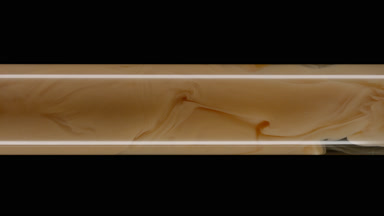 Macro shot of beige ink inside test tube with water filling it