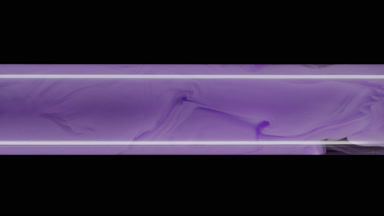 Macro shot of purple ink inside test tube with water filling it
