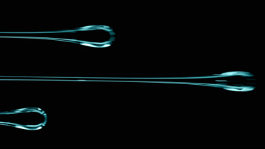 Macro of three flows of cyan viscous liquid on black background