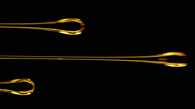 Three flows of yellow viscous liquid on black background
